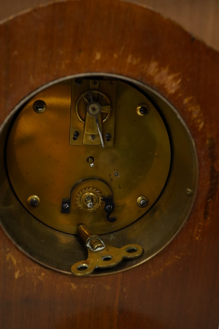 A late 19th century lacquered brass repeating carriage clock, by Henri Jacot and an Edwardian inlaid mantel timepiece with key, largest 23cm high